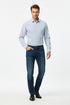 Light blue tennis ball pattern shirt on a white background
