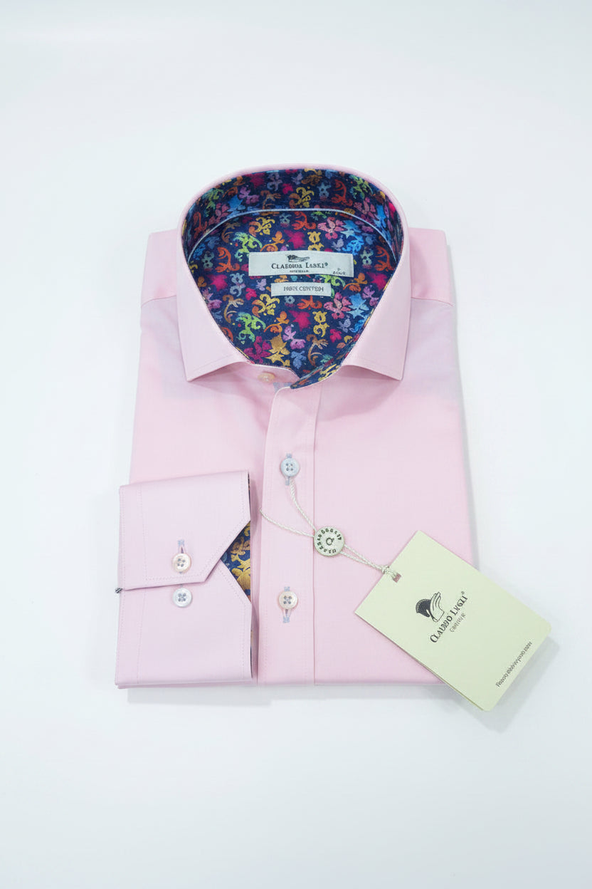 Pink dress shirt with colorful floral interior on a white background