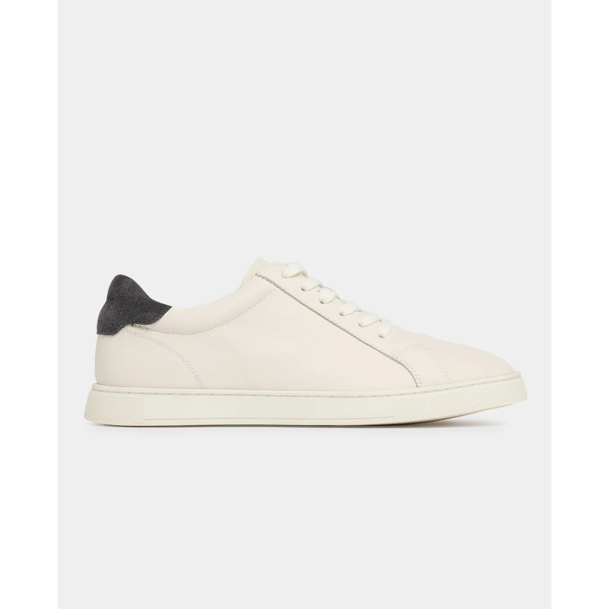 Cream sneaker with grey accents on a white background