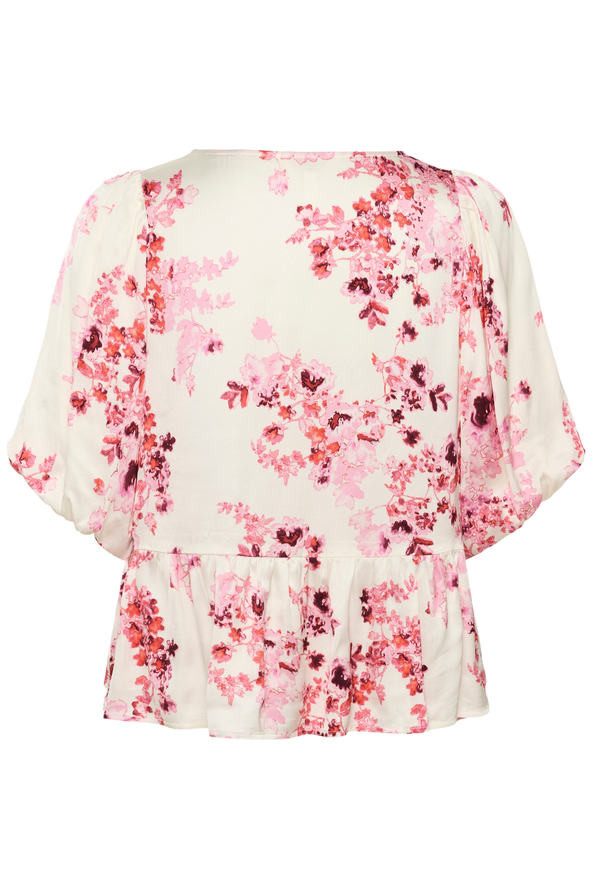 Floral blouse with pink and red patterns on a white background
