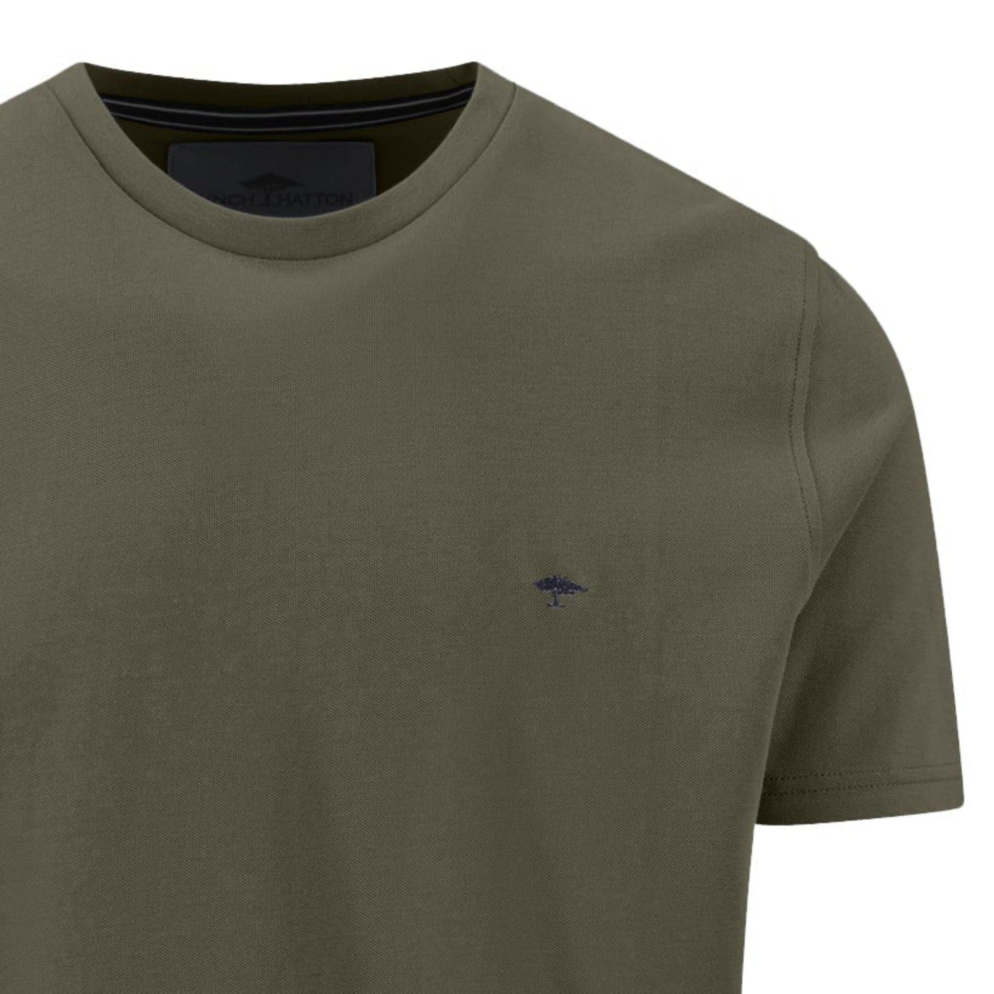 Green t-shirt with a small logo on a white background