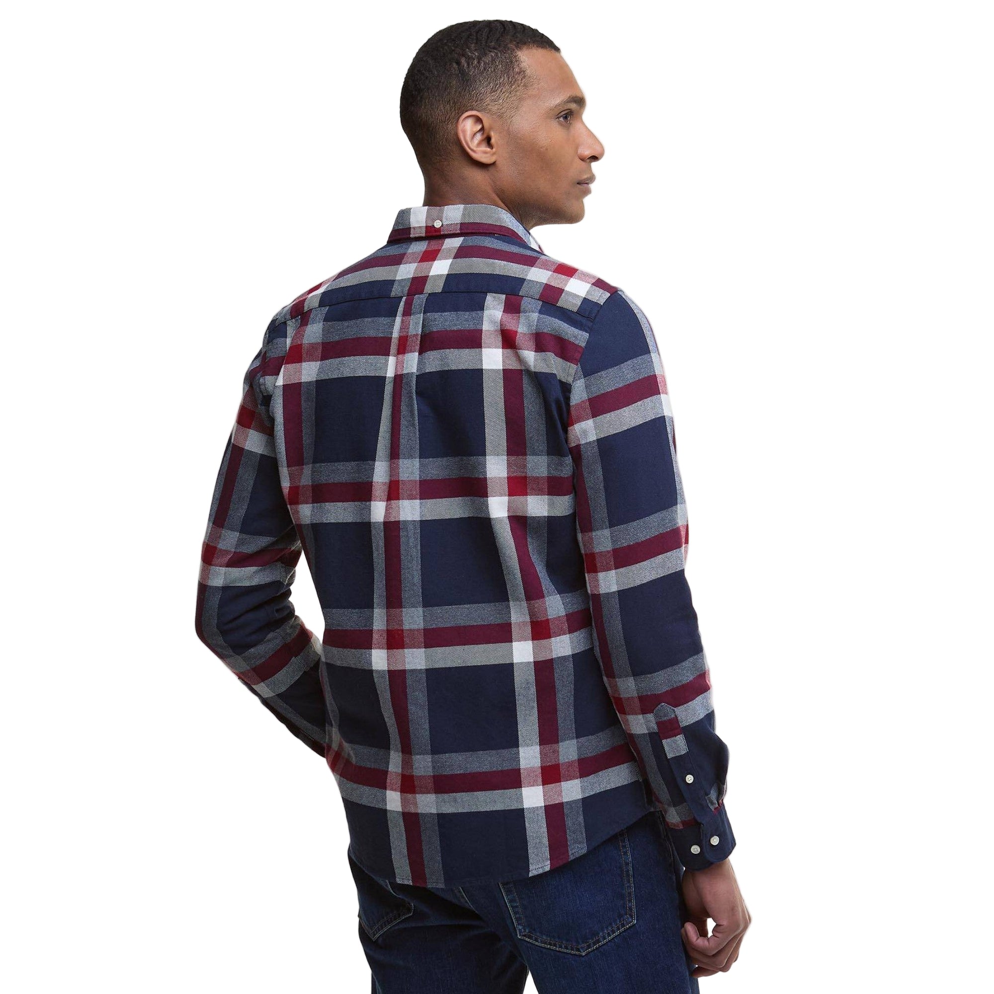 Man wearing a plaid shirt with a white background