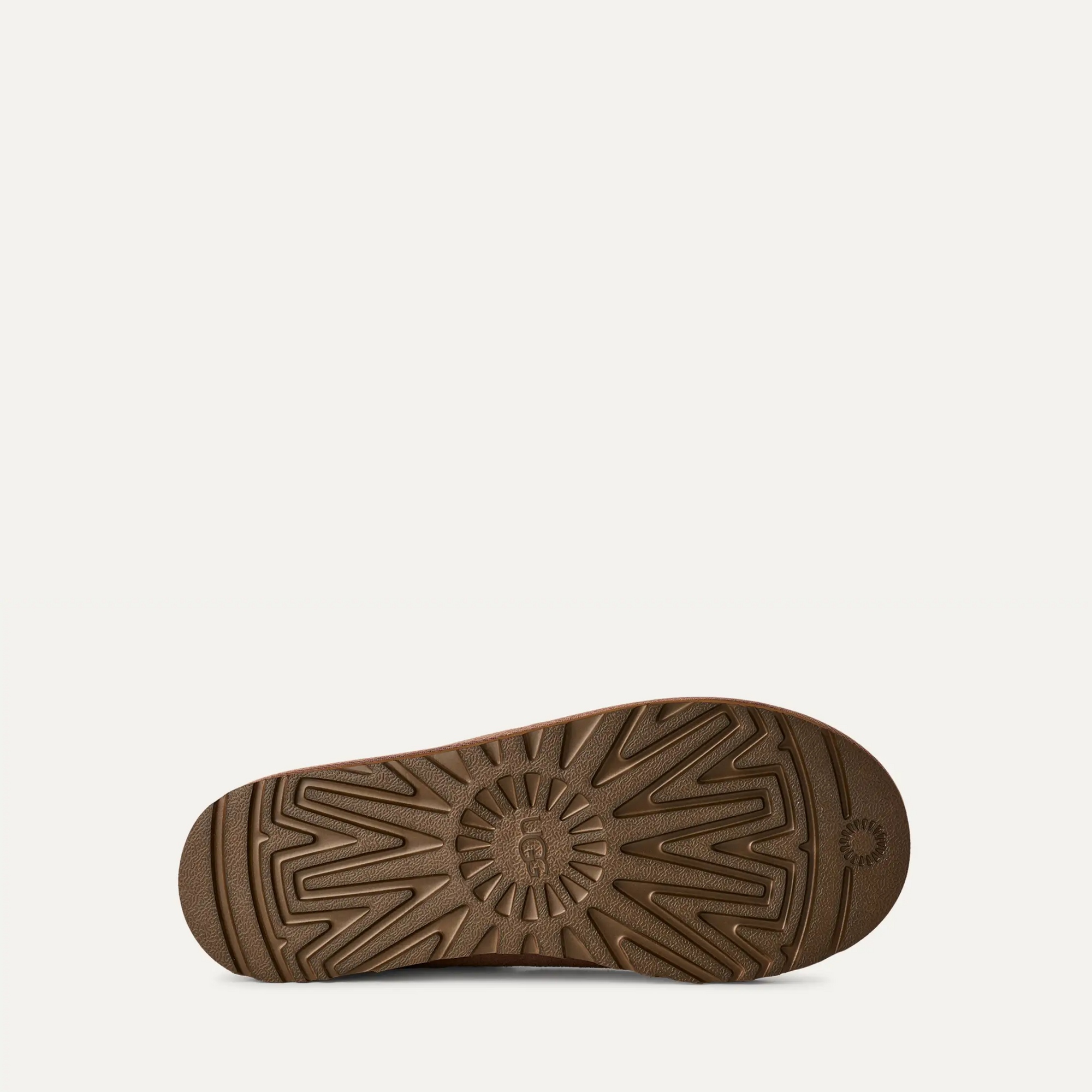 Brown sole of a shoe on a white background