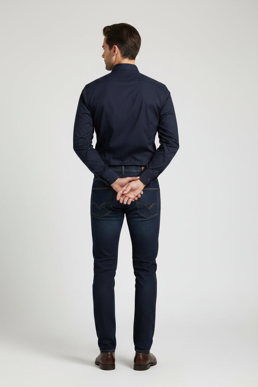 A dark navy blue long-sleeve button-down shirt with a classic collar, shown on a clean white background.