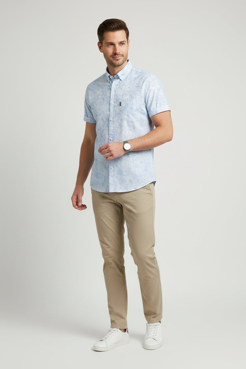 Light blue patterned short-sleeve shirt with Giorgio brand label on a white background