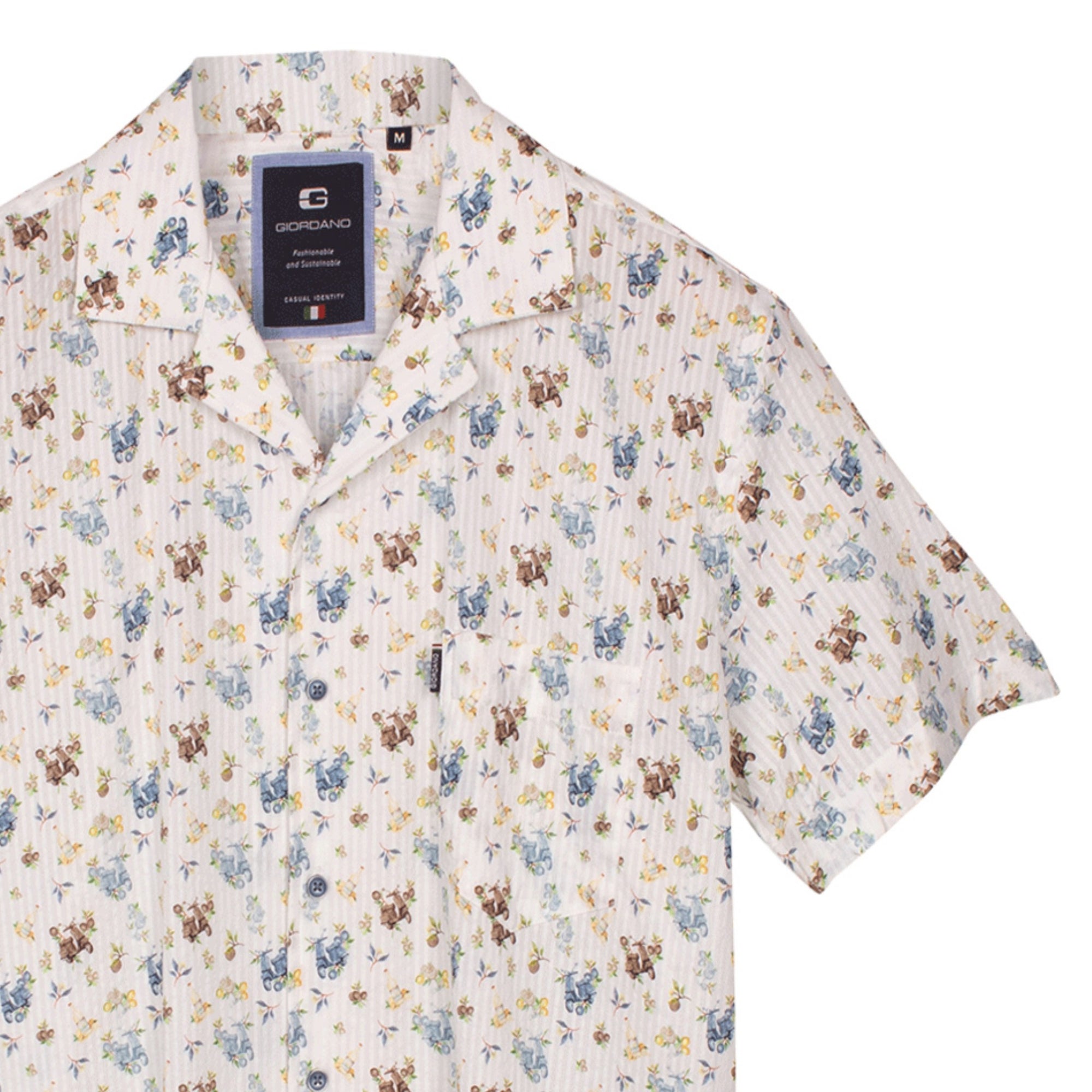 zoomed in Floral and moped patterned shirt on a white background