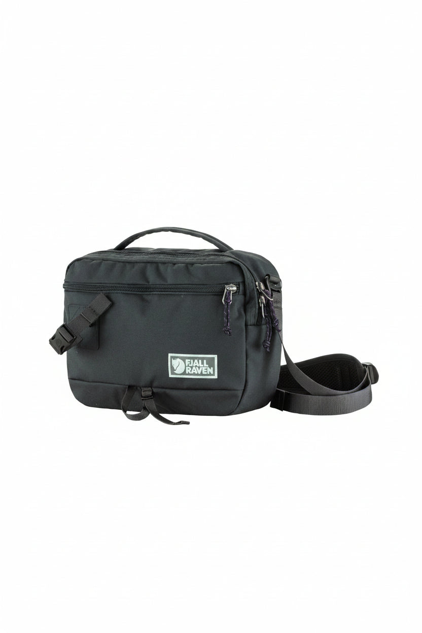 Black bag with a visible brand logo on a white background
