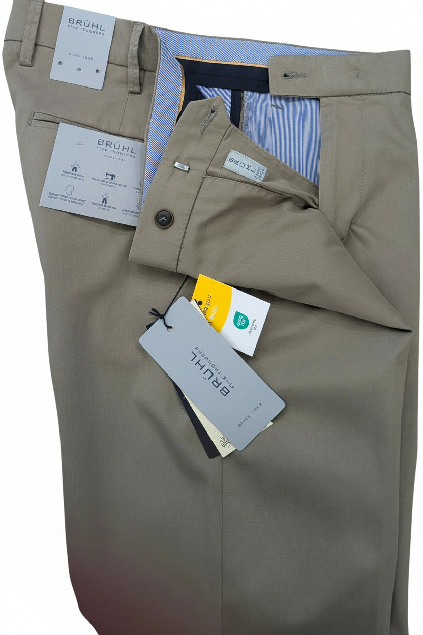 Beige pants with Brühl tags on a white background