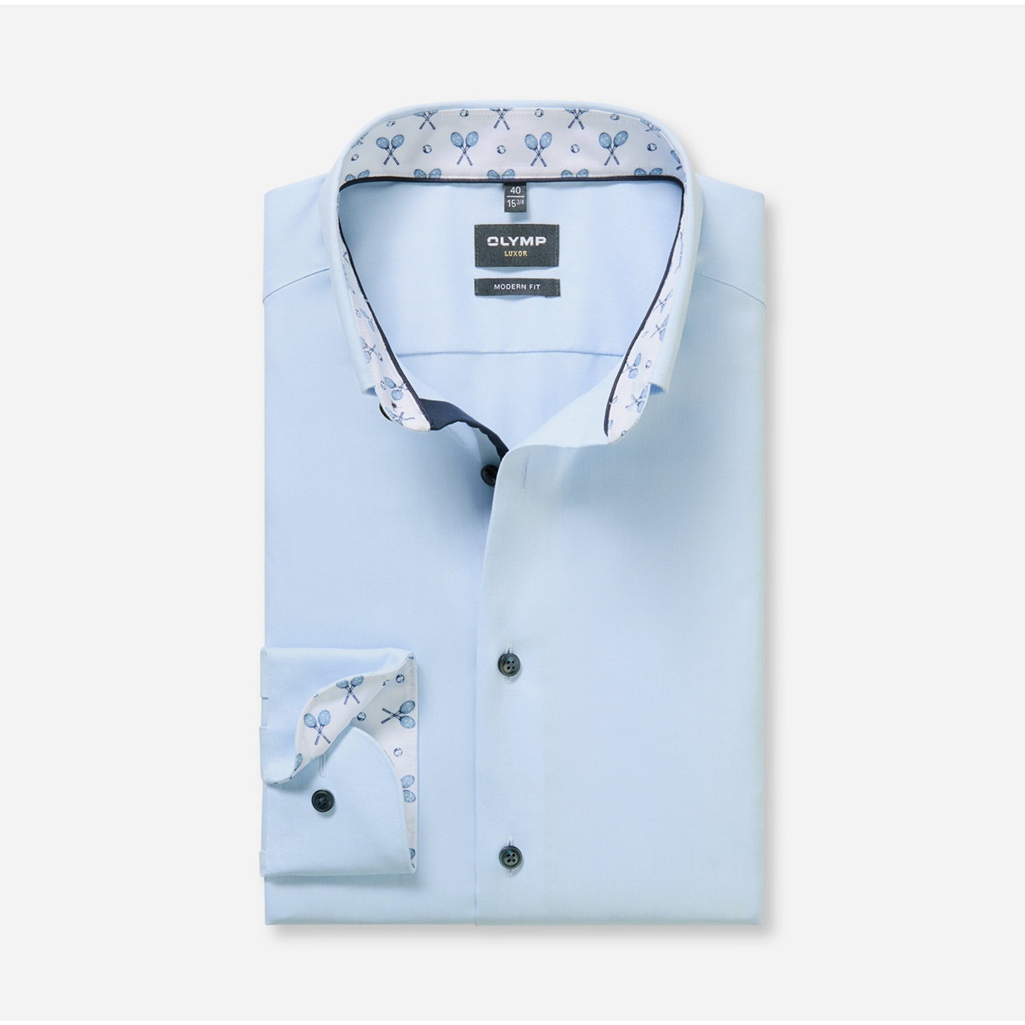 Light blue dress shirt with patterned collar and cuffs on a white background