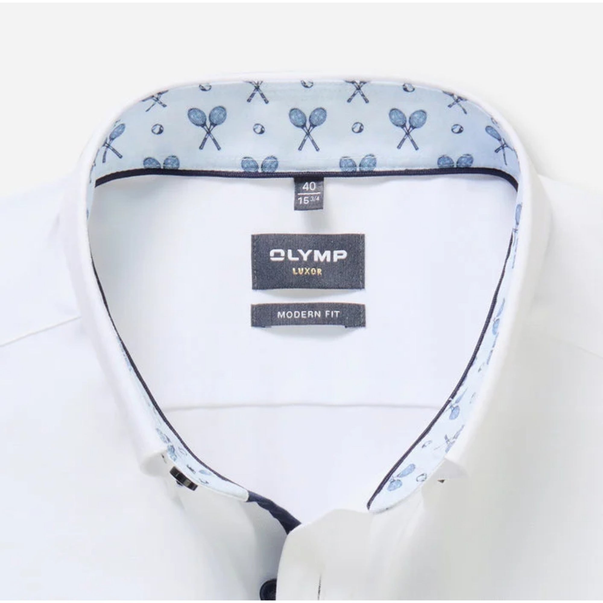 White shirt with blue patterned lining and Olymp label on a white background