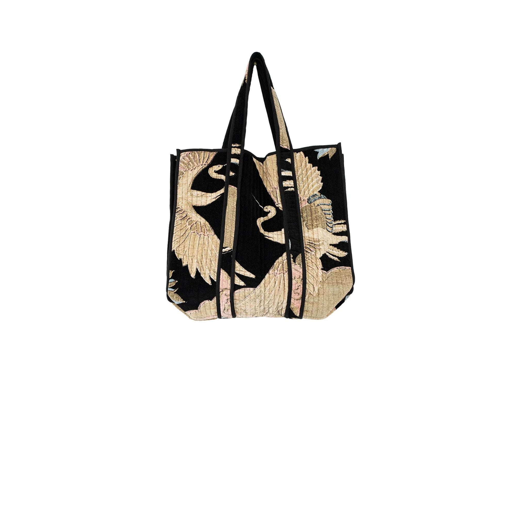 Tote bag with black and beige design on a white background