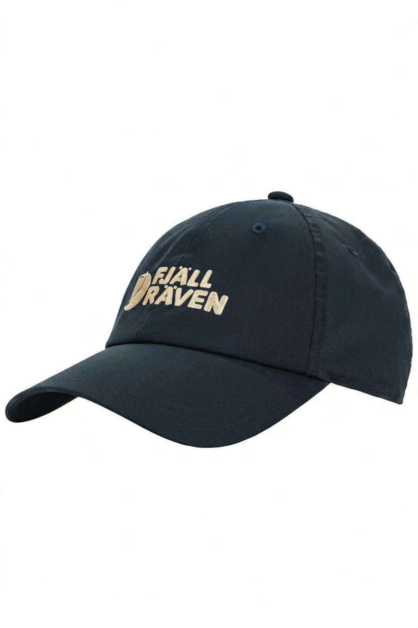 Black cap with 'Fjällräven' logo on a white background