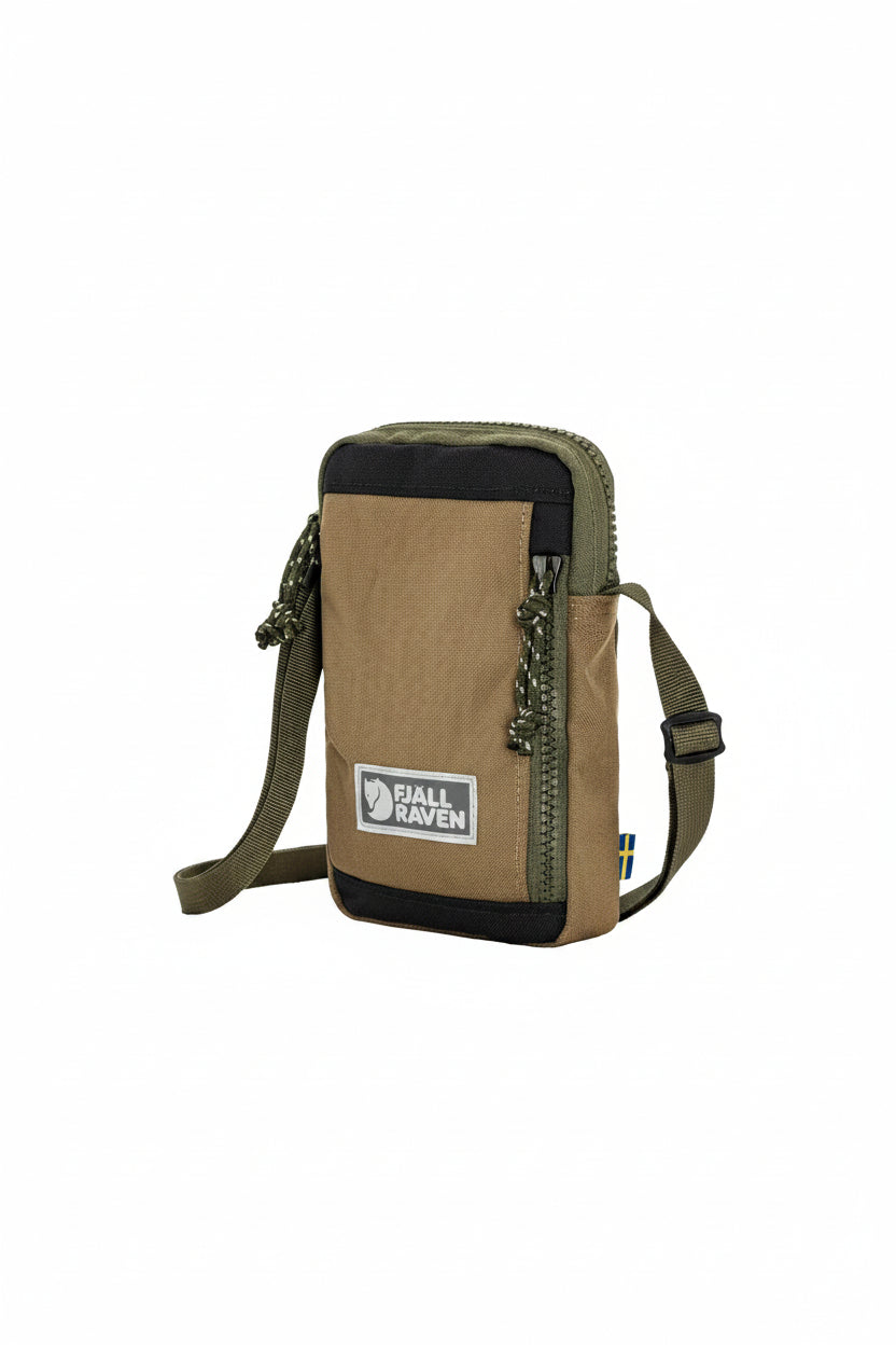 Green-Clay crossbody bag with black accents and visible Fjällräven logo on a white background
