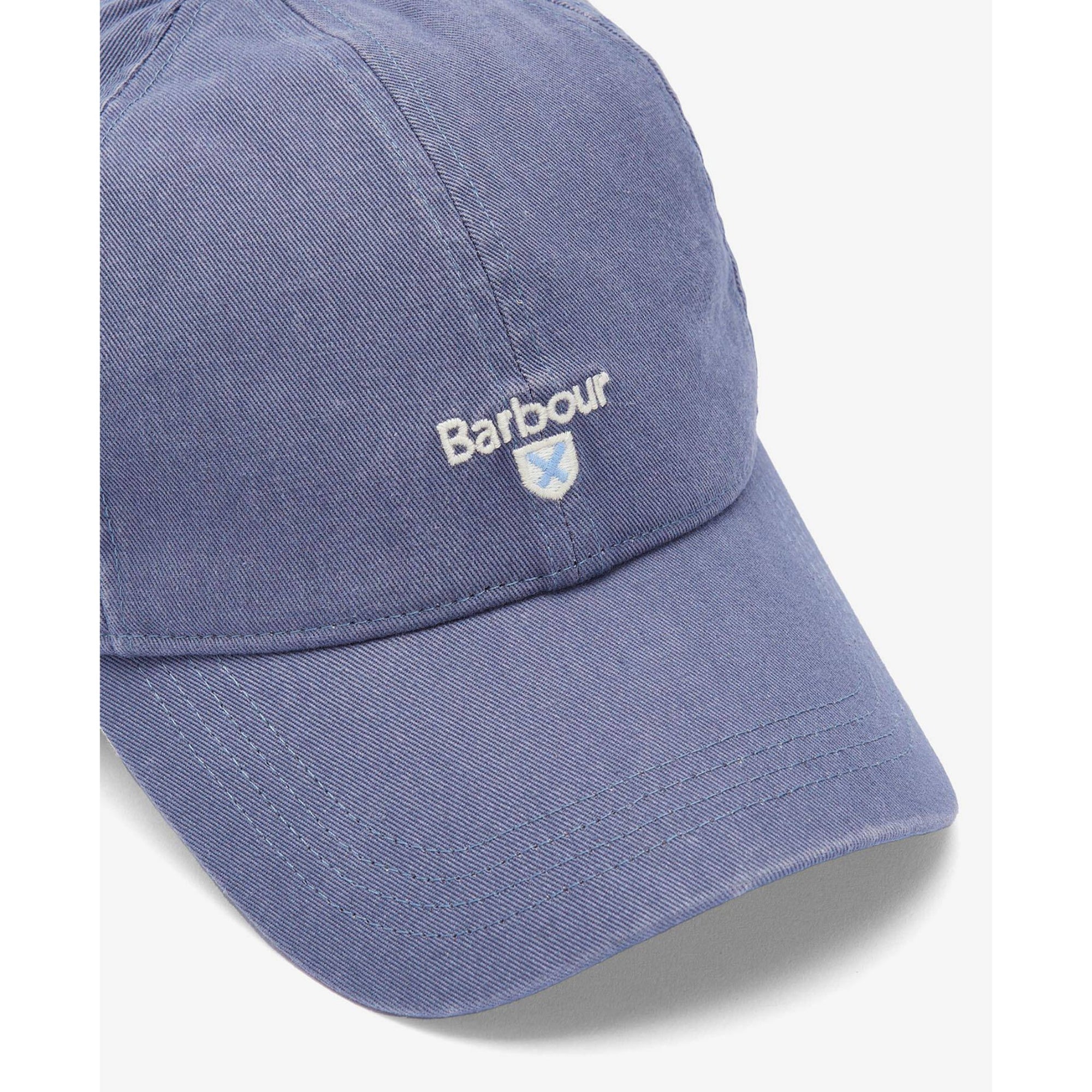 Blue cap with Barbour logo on a white background