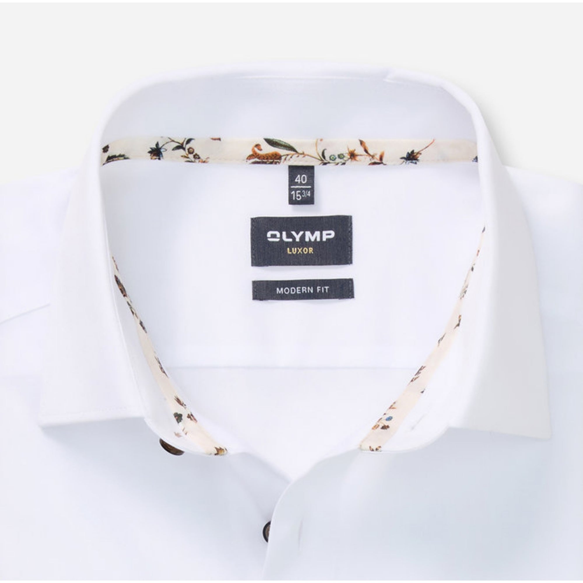 White shirt with floral collar and Olymp label on a white background