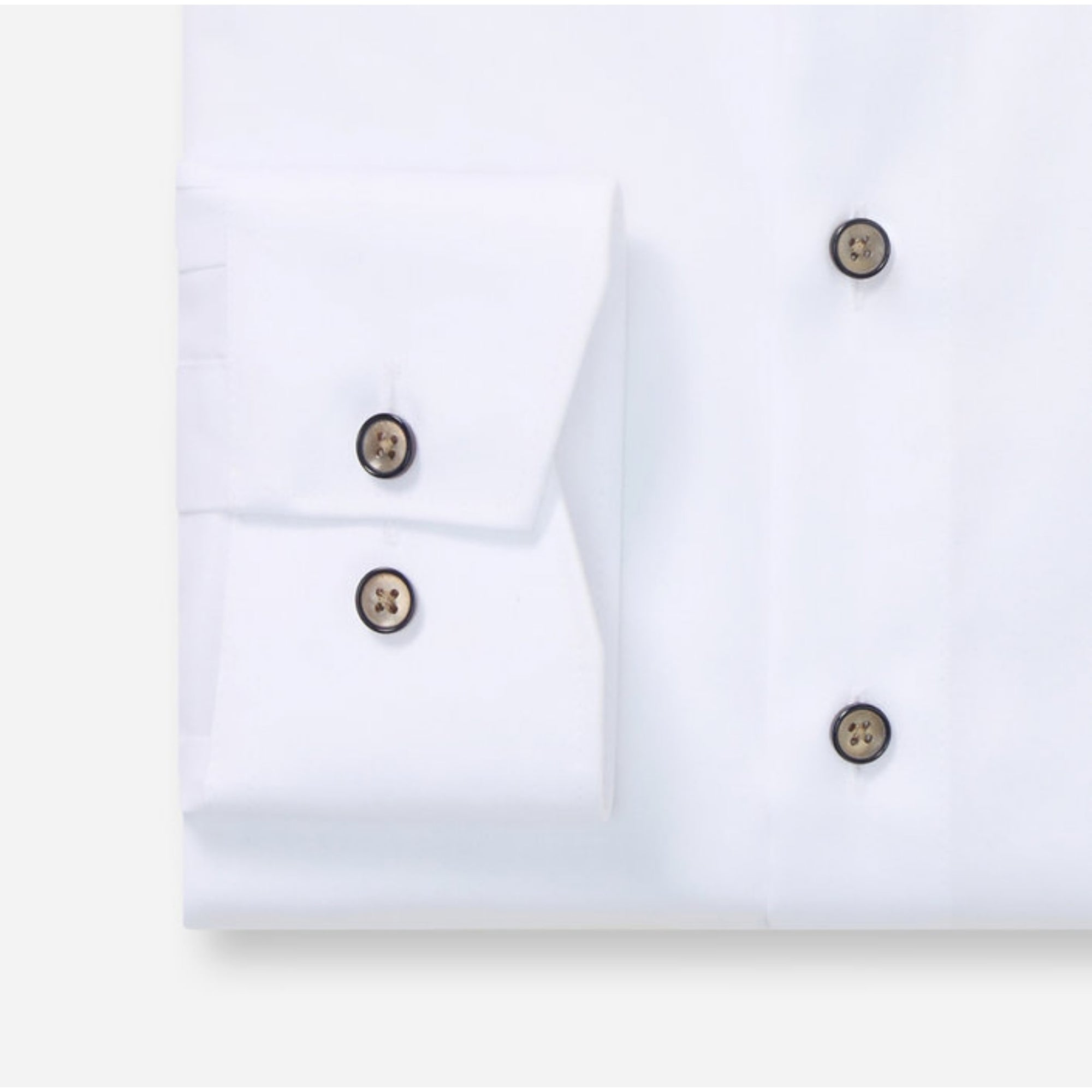 Close-up of a white shirt with brown buttons on a white background