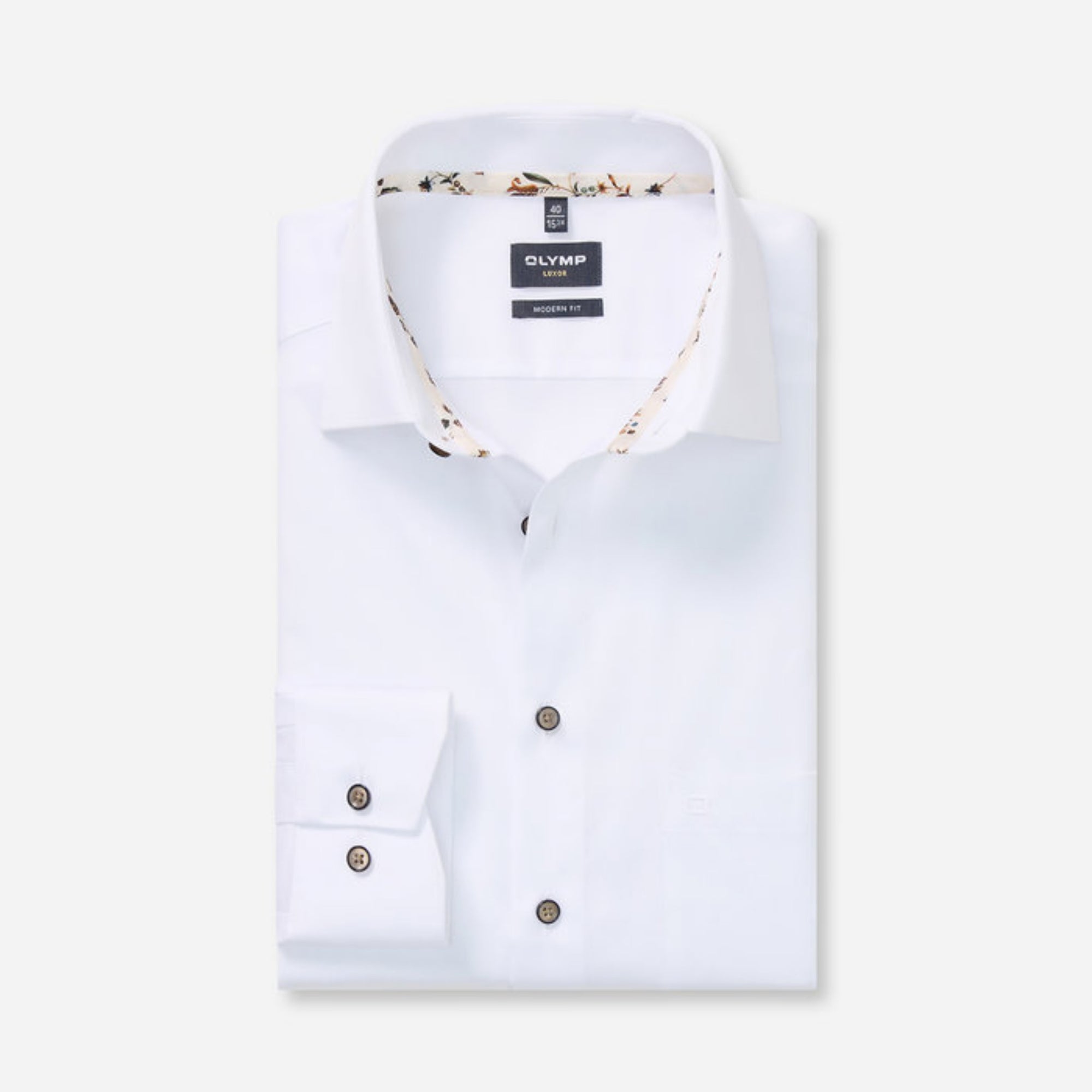 White dress shirt with brown buttons on a white background