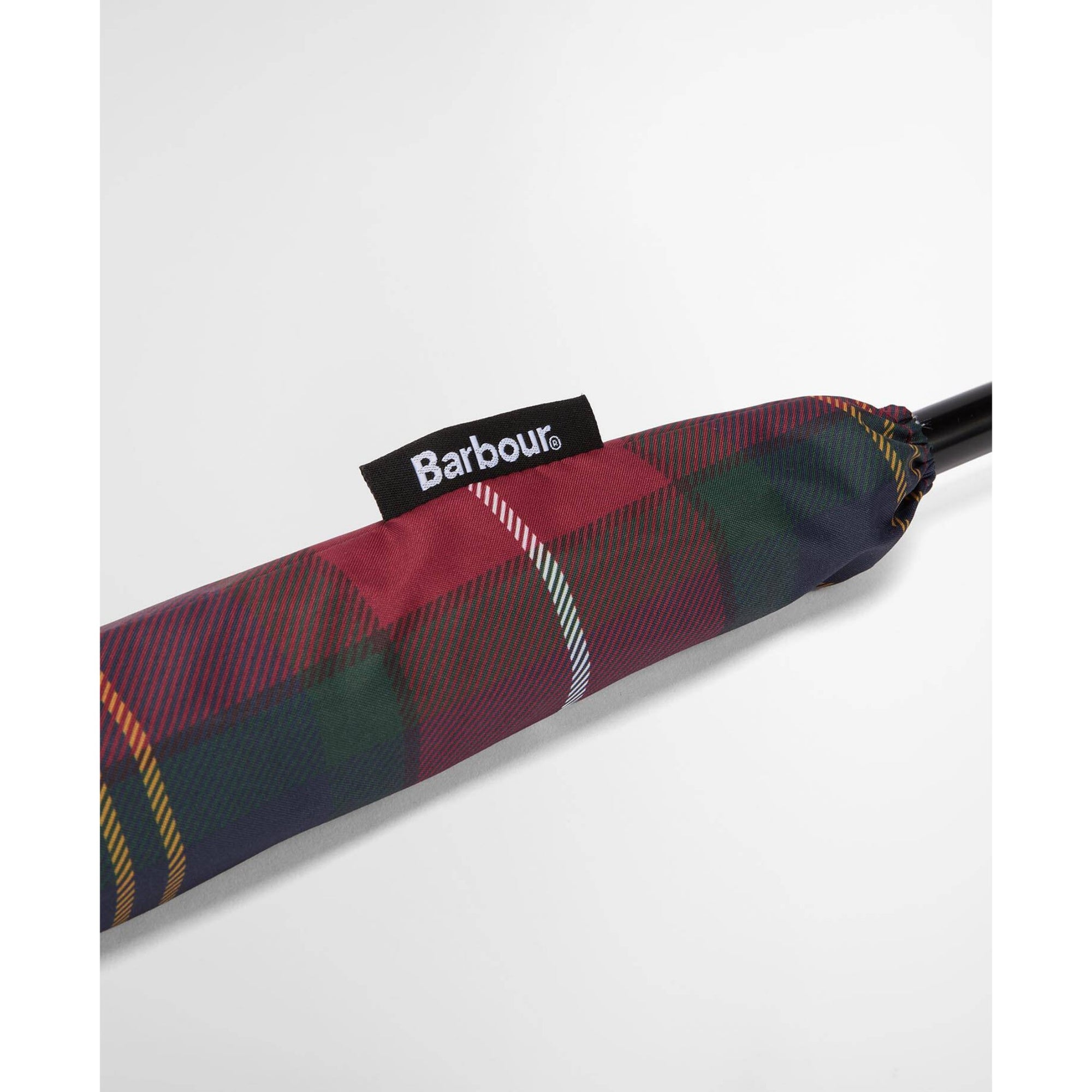 Plaid umbrella with Barbour logo on a white background