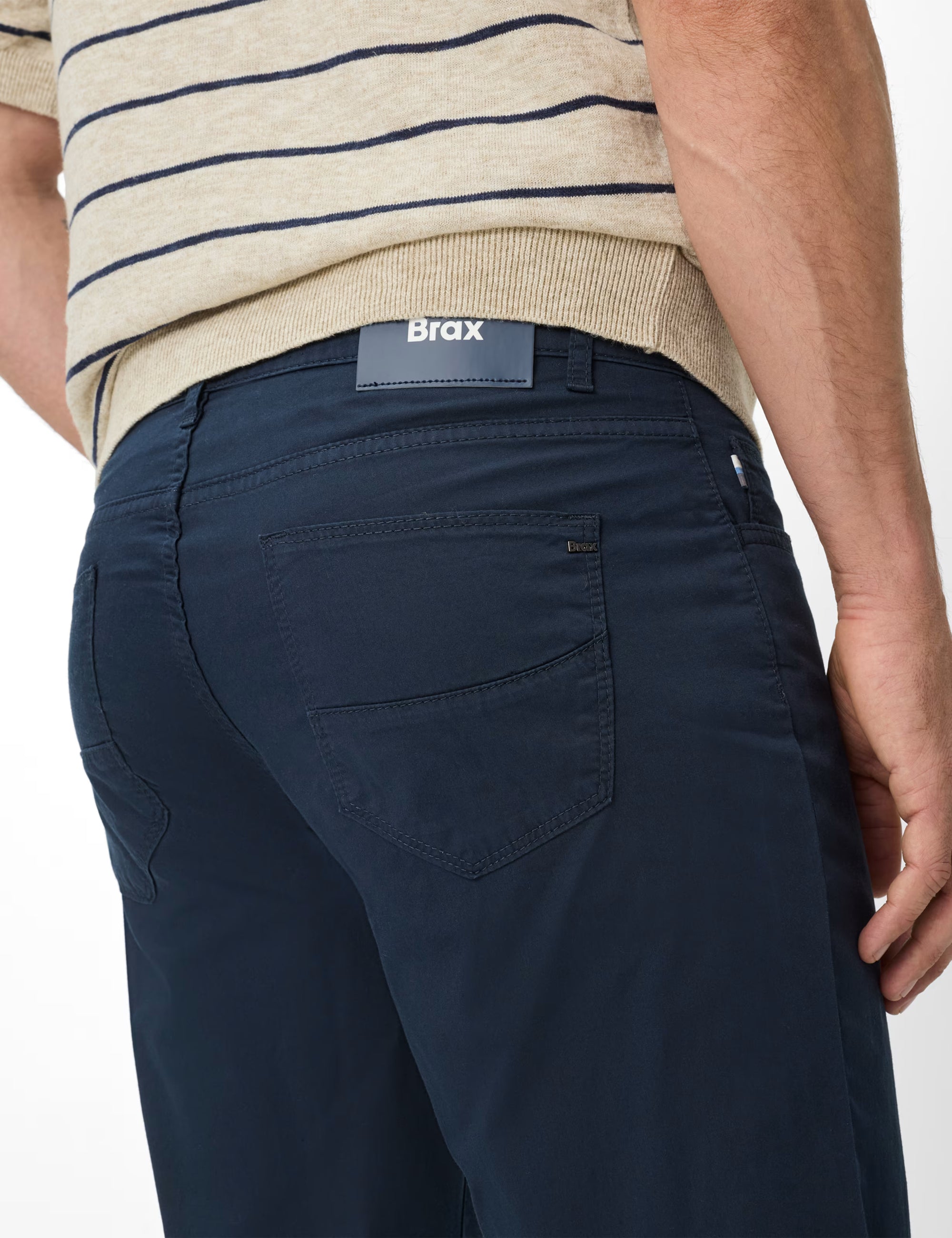 Navy pants with Brax label on a white background