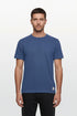 Man wearing a blue t-shirt on a white background
