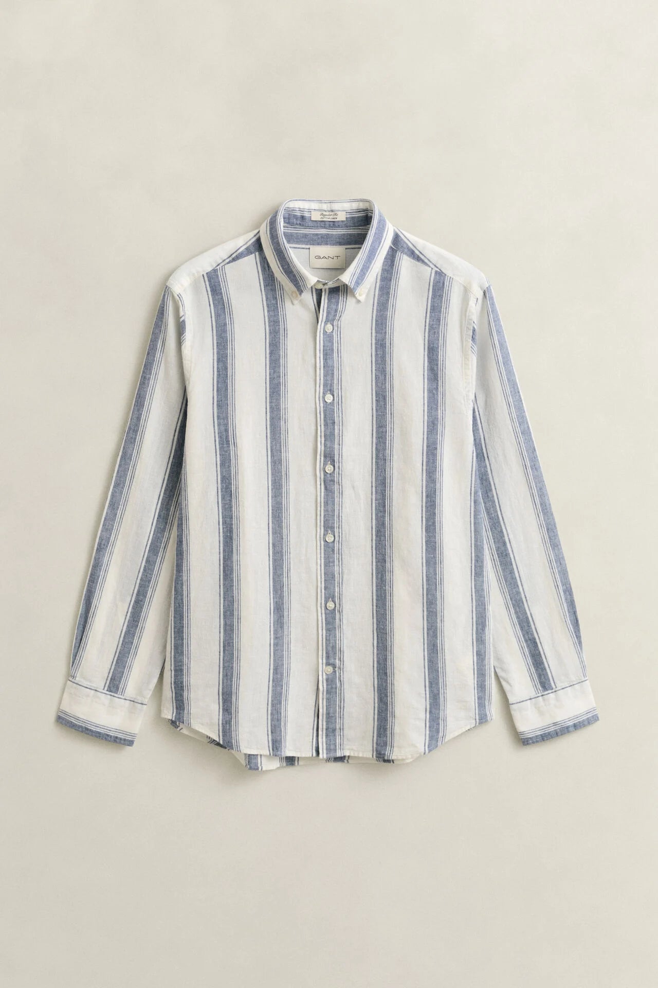 Striped shirt on a light beige background
