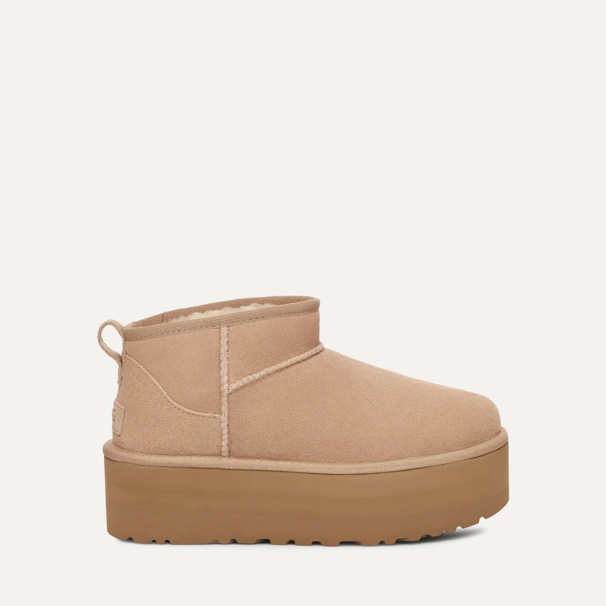Beige platform boot on a white background
