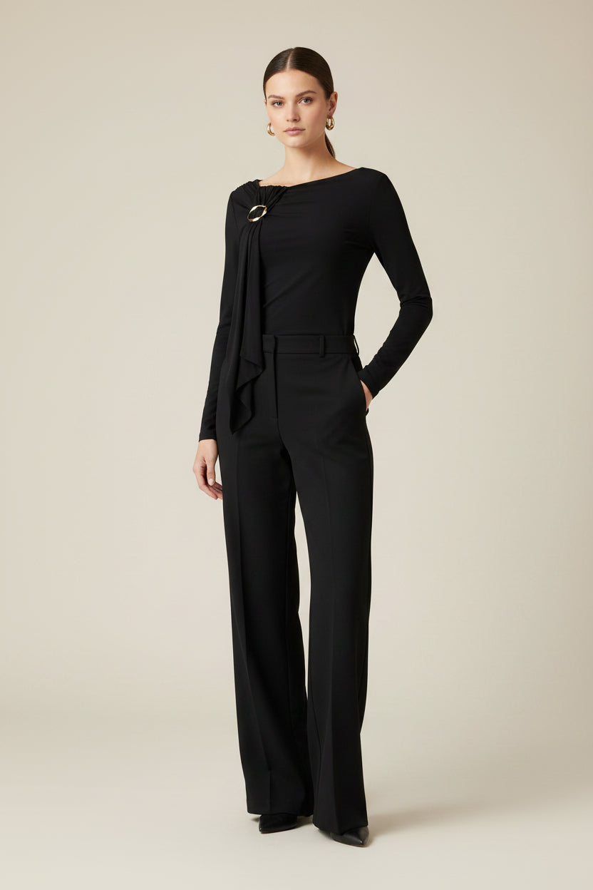 Women wearing a French Connection Maxine black jersey long sleeve top with draped detail and gold-tone ring.